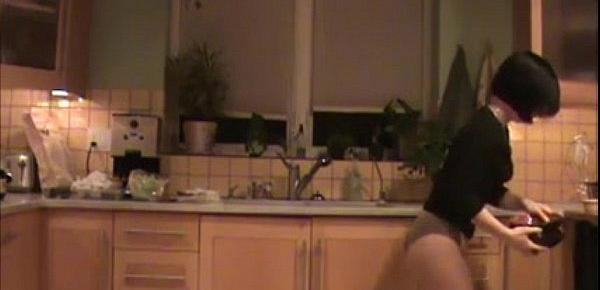  Mom cleans kitchen in Pantyhose